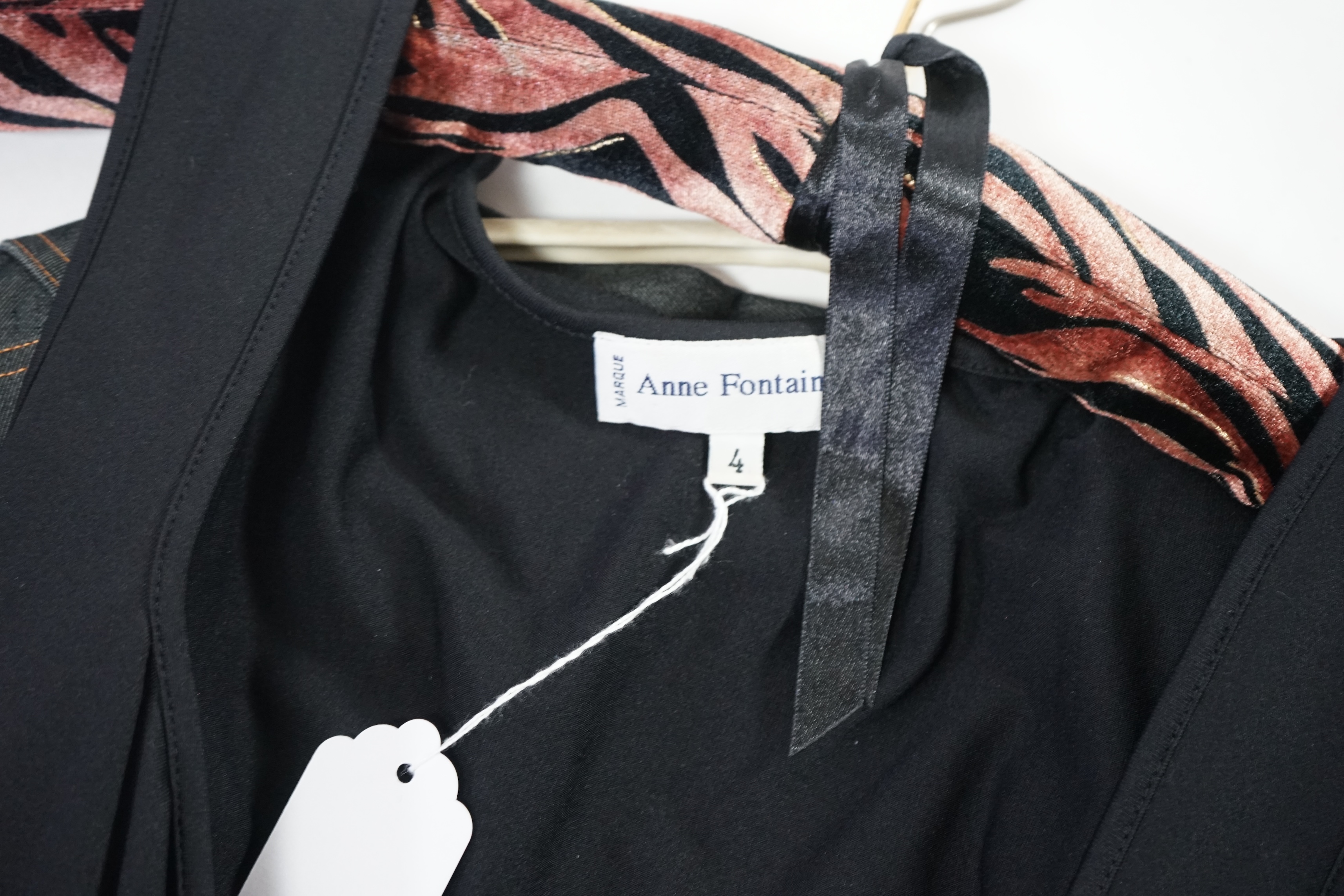 Two Anne Fontaine lady's jackets and a black top. Approx sizes 14-16 Proceeds to Happy Paws Puppy Rescue